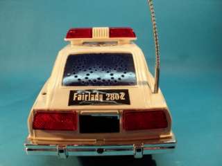 DATSUN FAIRLADY 280Z PATROL CAR POLICE CAR BTT/OP LIGHT SOUND BOXED 