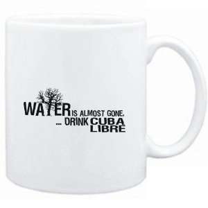  Mug White  Water is almost gone  drink Cuba Libre 