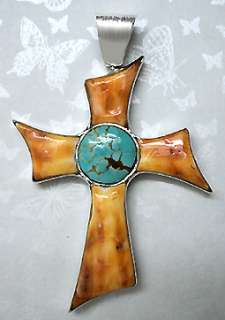 This is a COMPLETELY handcrafted sterling silver REVERSIBLE cross with 