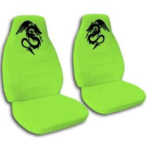  2 lime green car seat covers with a black dragon, for a 