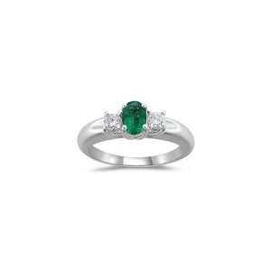 25 Cts Diamond & 0.34 Cts Emerald Three Stone Ring in 18K White Gold 