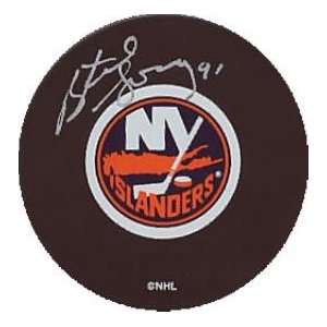  Butch Goring Autographed Hockey Puck   ) Sports 