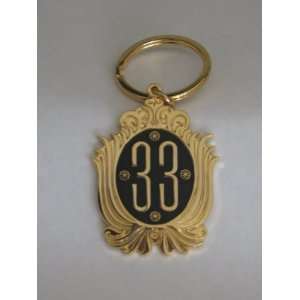  Key Chain from Club 33 Disneyland gold and black 