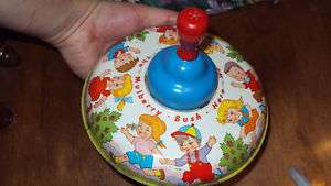 Vintage Ohio Art Spinning Tin Toy Mulberry Bush top  