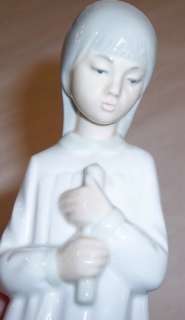 Lladro NAO Girl holding a candle  
