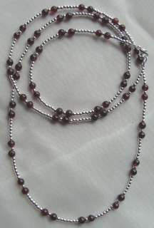  Silver 27 necklace with 4mm genuine Garnet Beads. The silver 