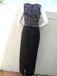   excellent condition and sz S, it measures length 59 , bust 38, hips 40