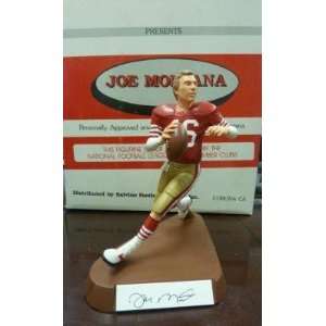  Joe Montana Autographed Jersey   Red Salvino Figurine PSA 