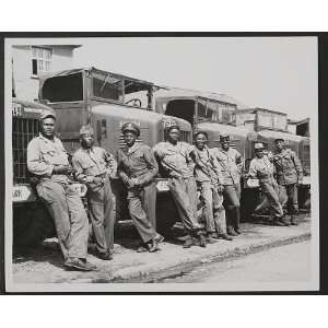   mechanics in front of four large trucks,c1945,R Hardin