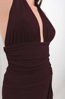 Elegant evening gown with deep V halter neck, open shoulders, ruched 