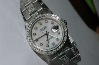 rolex oyster perpetual date with diamonds Model 15010  