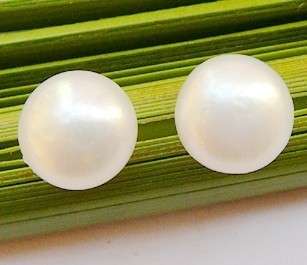 postage for any additional earrings is free colour cream white