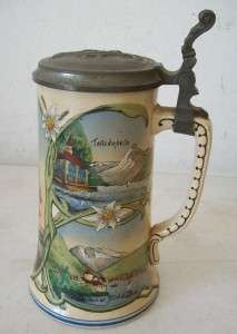  auction is this beautiful 8 tall, lidded German Stein with the name 