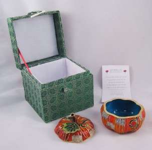 Store your treasured trinkets in this perky pumpkin cloisonne box 