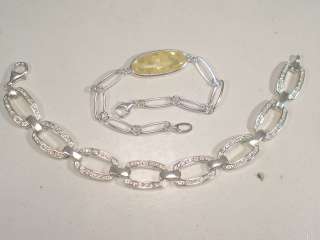 This Bracelet is STERLING SILVER and it is stamped .925