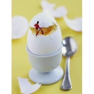  Miniature Footballer Taking the Lid off a Boiled Egg 