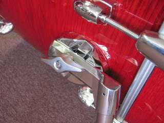 tom holder accommodates two toms as well as a cymbal holder to provide 