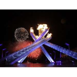  Fireworks Explode Behind the Olympic Flame at Opening Ceremony 